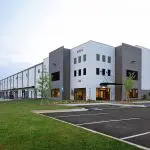 commercial building exterior that needs to be repainted