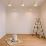 Freshly painted room with ladder and supplies showing how long does interior painting take to complete in a Manhattan Beach home