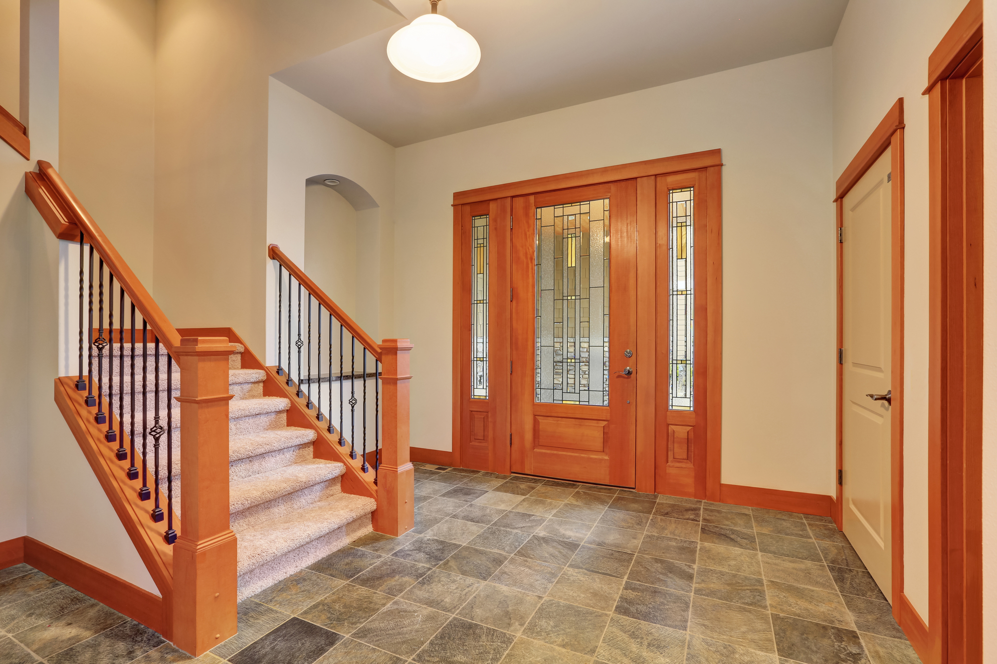 Entryway interior with luxury stained glass door