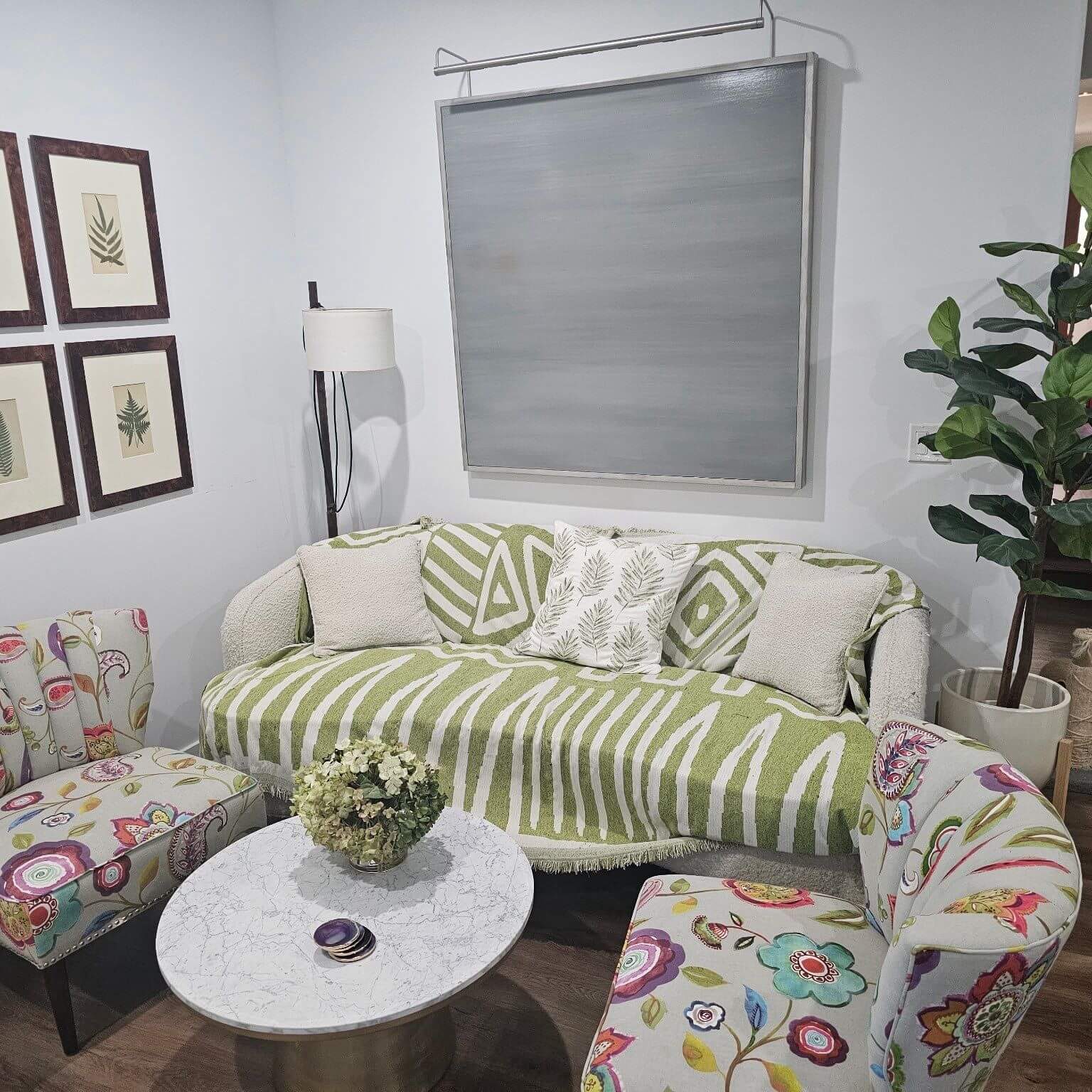 Bright and cozy living room with light neutral wall colors and clean interior painting, completed by Sucro Painting Contractors to create a fresh, welcoming space.